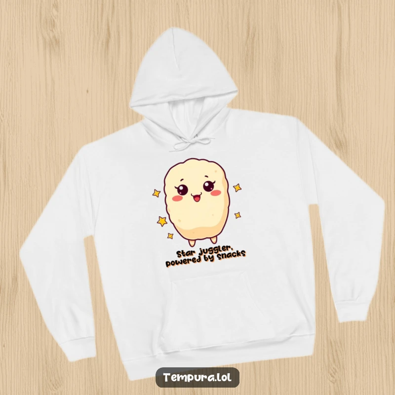 Funny Hoodie depicting a happy tempura piece juggling stars, perfect for cold days and warm laughs.