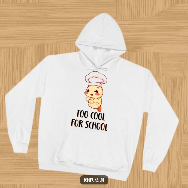Funny hoodie featuring a tempura shrimp heroically wearing a chef hat, ready to serve up warmth and smiles.