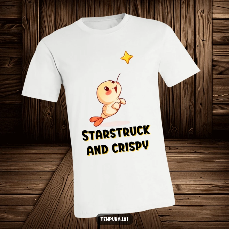 Funny t-shirt showing a tempura shrimp character looking up in surprise at a shooting star, full of awe.
